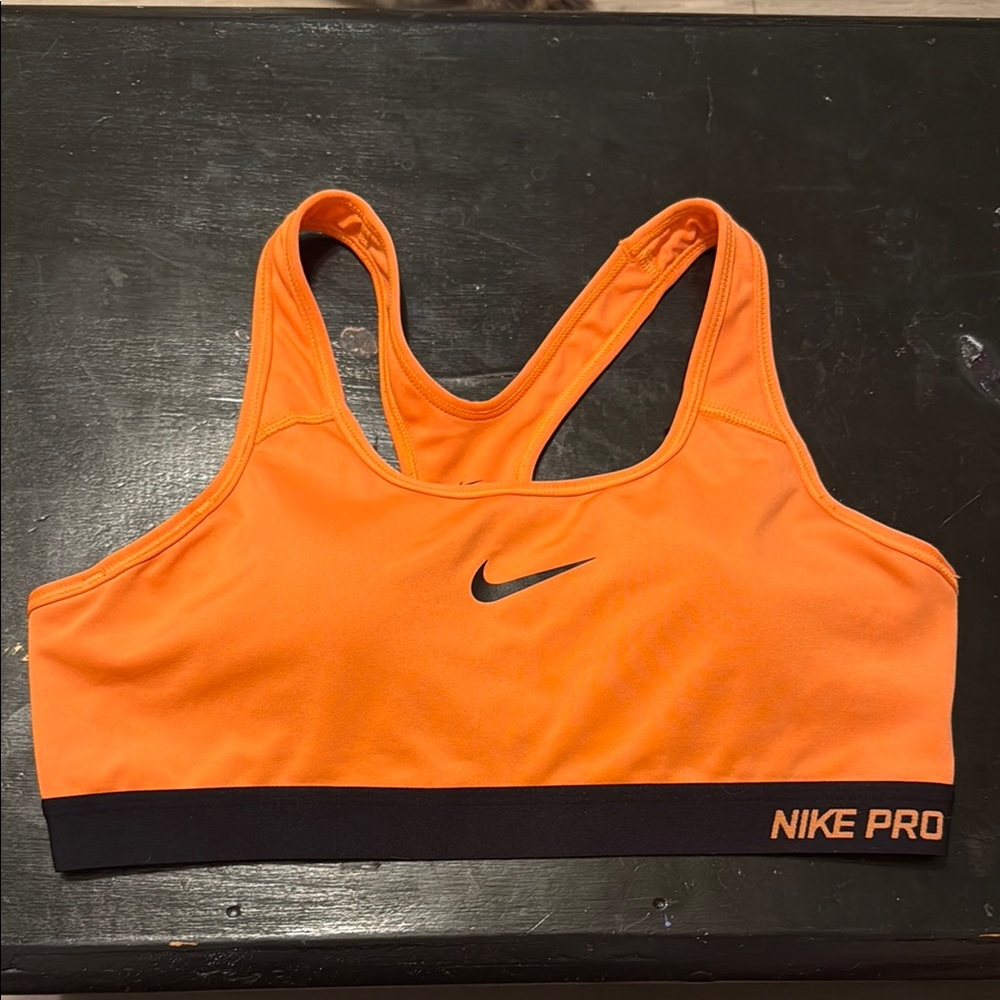 Bright Orange Nike Dri Fit sport bra size women’s large with removable cup pads